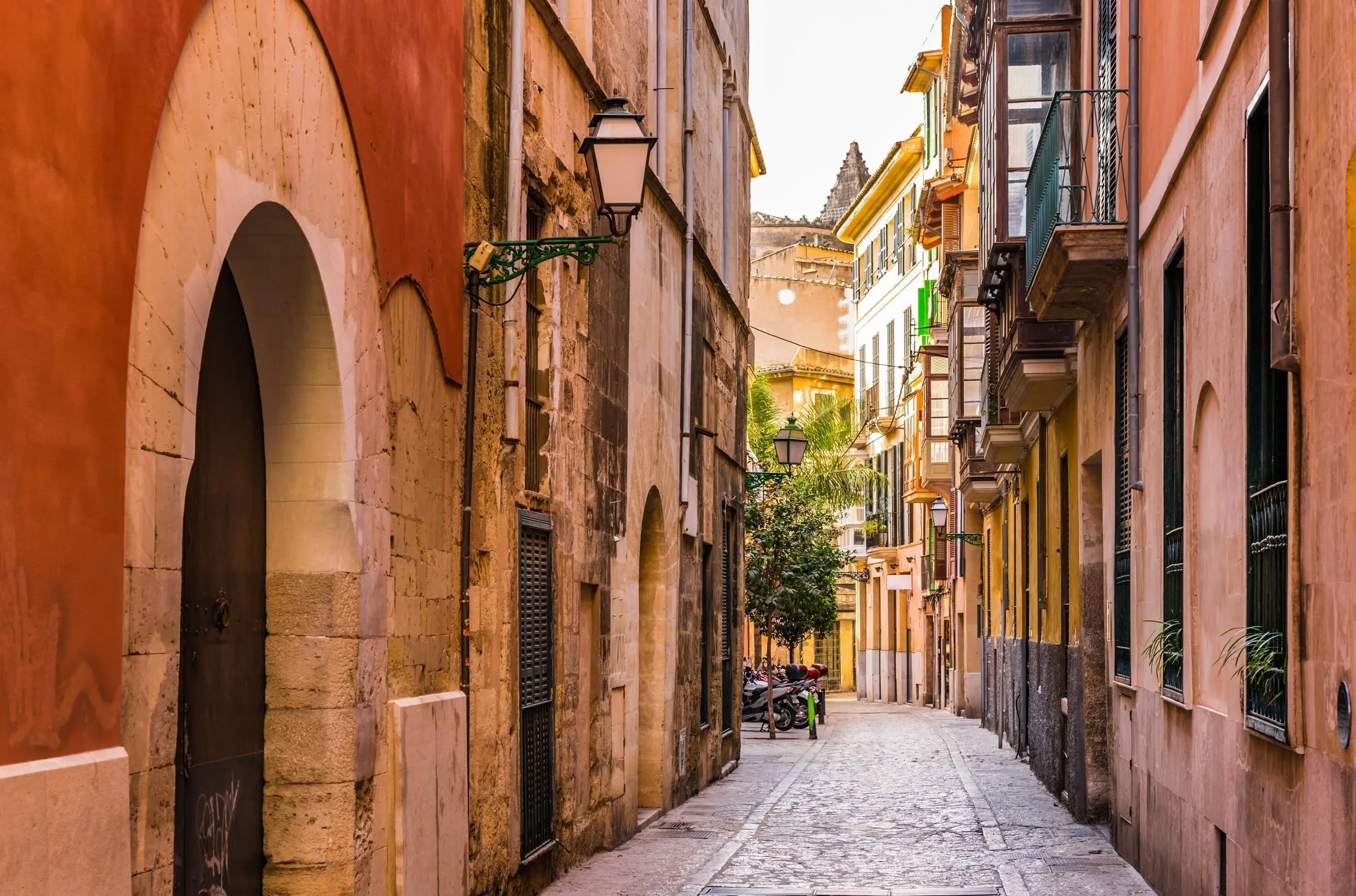 Narrow street in Palma's old town with traditional architecture