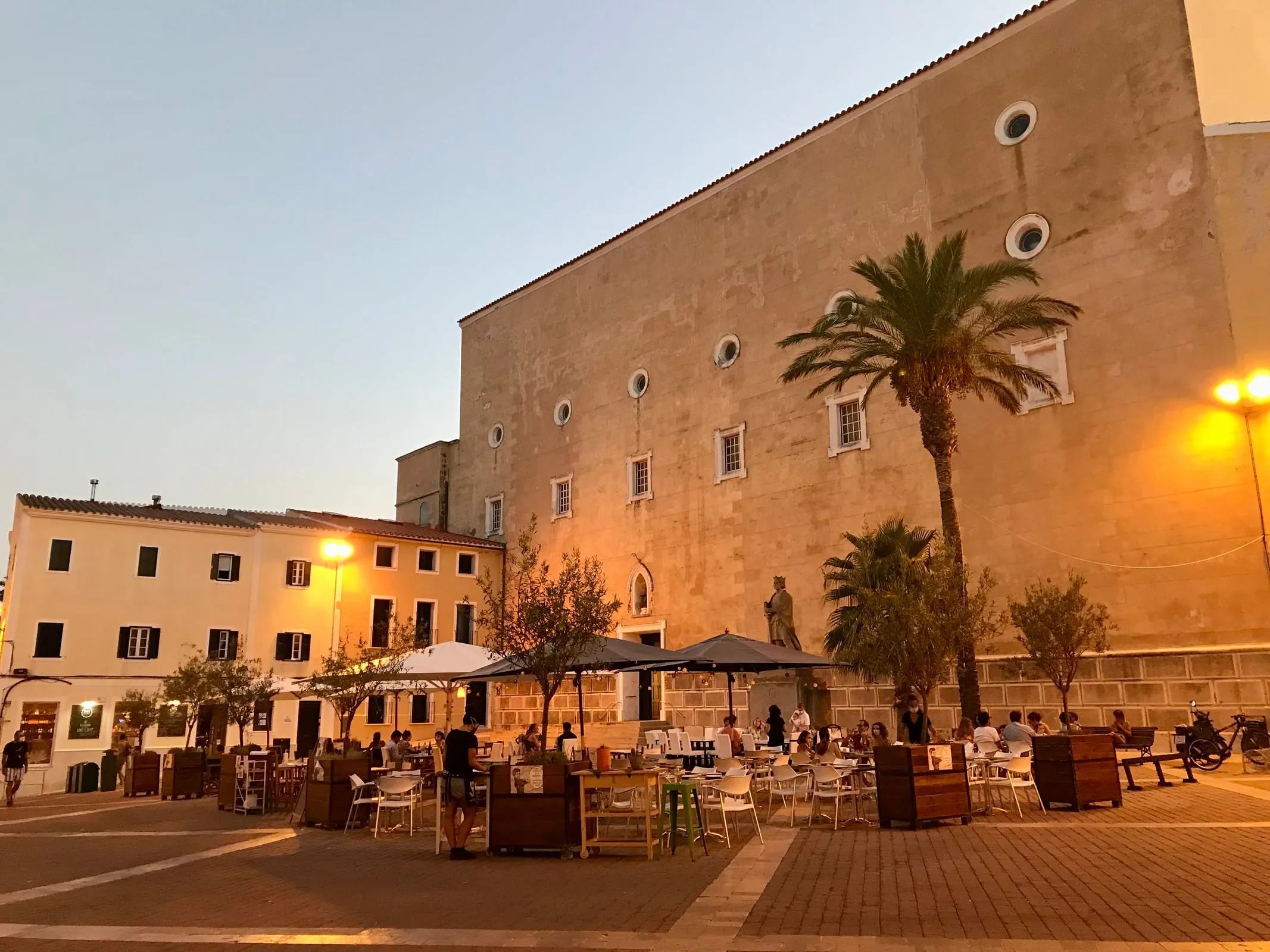 Historic plaza in Mahón's old town with traditional architecture